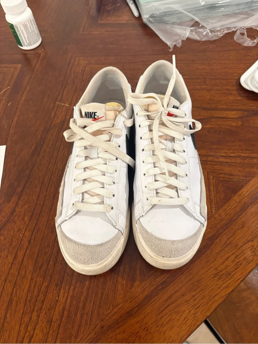 Nike White Sneakers with Black Swoosh and Suede Accents